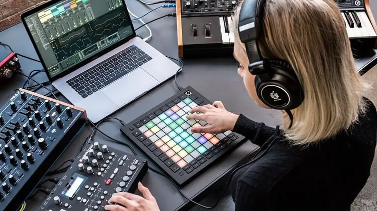 Woman Using Novation Launchpad